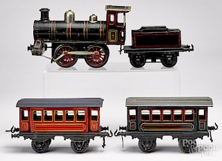 Bing painted tin clockwork four-piece train set