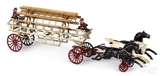 Cast iron horse drawn fire ladder wagon
