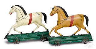 Two Fallows painted American tin horse pull toys