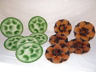 GROUP OF 12 FRENCH GLAZED TERRA COTTA OYSTER PLATES