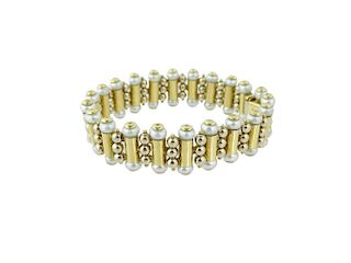 (1) One 18 Karat Yellow Gold Pearl Bracelet.