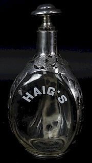 HAIGS Sterling Silver Overlay Bottle.