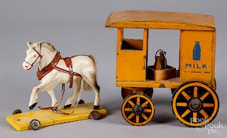 Painted wood horse drawn milk wagon