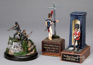 Three toy soldier groupings