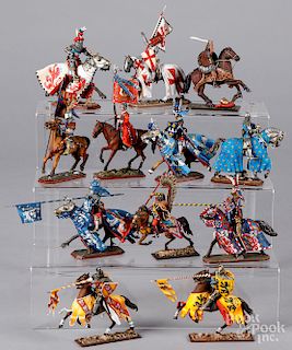 Twelve painted miniature metal soldiers