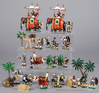 Large group of cast metal miniature Zulu warriors