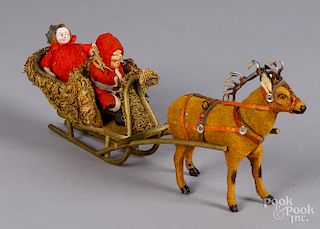 German composition Santa Claus in moss sleigh