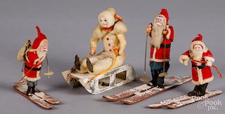 Three Japanese composition Santa Claus on ski's, etc.