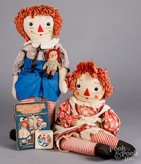 Three Raggedy Ann and Andy cloth dolls