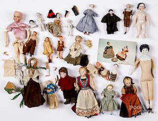 Large group of small bisque and porcelain dolls