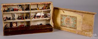 Diorama of miniatures with sliding lid
