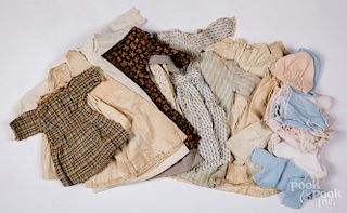 Group of early doll clothes.