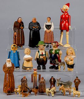 Collection of ramp walkers and carved figures
