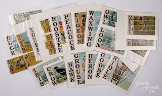 Twenty-one picture puzzle word strips.