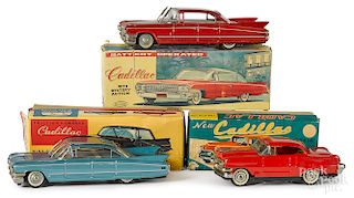 Three Japanese tin friction Cadillacs