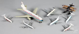 Eight small toy airplanes