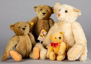 Four Steiff teddy bears