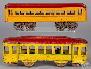 Two tin hill climber trolley cars