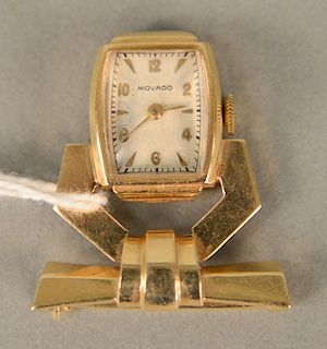 Movado ladies 14 karat gold lapel watch. 12.7 grams total weight