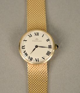 Movado 14 karat gold ladies wristwatch with 14 karat gold mesh bracelet. lg. 7 in., 36.9 grams total weight