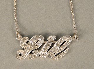 14 karat white gold chain with Lil pendant, set with diamonds.