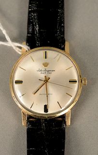 Jules Jurgensen Automatic mens wristwatch in gold filled case with leather band.