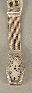 Concord ladies 18 karat white gold wristwatch with adjustable 14 karat white gold mesh band. 19.5 grams total weight