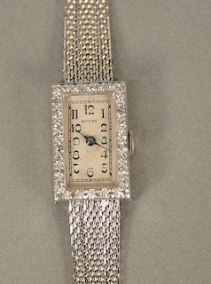 Glycine 18 karat white gold ladies wristwatch with diamond surround. lg. 5 5/8 in., 23.5 grams total weight