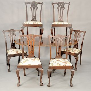 Seven piece dining set to include banded inlaid dining table with one 21 1/2 inch leave and pads along with six Chippendale style si...