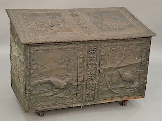 Large copper, wood box with overall embossed copper panels depicting European scenes. ht. 28 1/2 in., wd. 40 in.