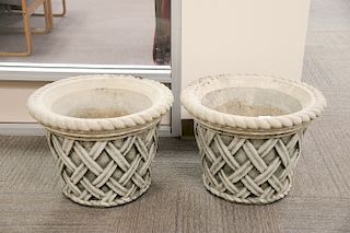 Pair of Nina Studio cement planters, basket weave pattern. ht. 15 in., dia. 20 1/2 in. Provenance: From the Estate of Deborah G. Black of Greenwich, C