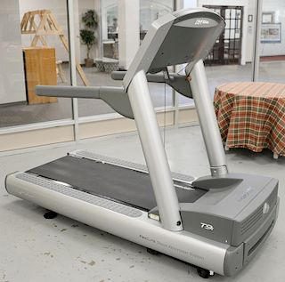 Life Fitness T9i treadmill with Flex Deck Shock absorption system (retails for $5,500.00). Provenance: From the Estate of Deborah G....