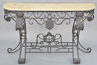 Marble top hall table on scrolled iron base. ht. 36 in., wd. 57 in., dp. 21 in.