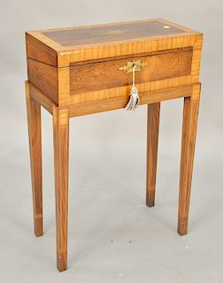 Rosewood banded inlaid lap desk on custom stand with brass inlay. ht. 29 1/2 in., top: 10" x 20" Provenance: An Estate from Farmingt...