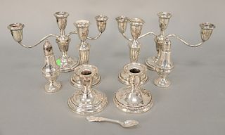 Sterling silver lot of weighted candelabra and candlesticks. Provenance: From the Estate of Deborah G. Black of Greenwich, Connecticut