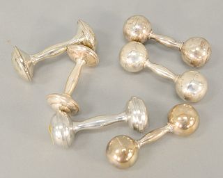 Group of six baby rattles to include three Tiffany sterling rattles with boxes. lg. 3 1/2 in. to 4 1/4 in. Provenance: From the Esta...