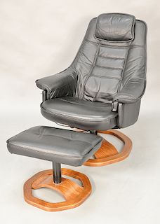 Leather easy chair and ottoman.