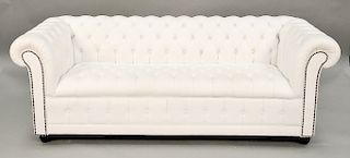 Chesterfield sofa, white leather (slight discoloration on seat). ht. 29 in., lg. 82 in.