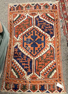 Two piece lot to include a Hamaden Oriental runner (2'6" x 9'6") and a throw rug (2' x 3'3").