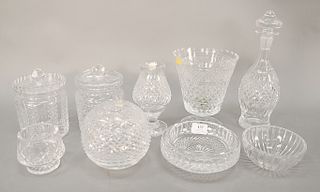 Group of nine Waterford crystal pieces to include two biscuit jars, decanter, vases, etc. ht. 2 1/2 in. to 12 in. Provenance: From t...