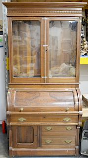 Two piece lot to include cylinder roll top Victorian secretary desk (ht. 88 in., wd. 40 in.) and Victorian armchair (not assembled). All pieces accoun