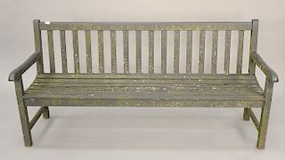Teak outdoor painted bench. ht. 35 in., lg. 72 in. Provenance: From the Estate of Deborah G. Black of Greenwich, Connecticut