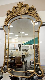 Large George II style giltwood border glass mirror, arched crest with foliate scrolls and shells. ht. 67 in., wd. 37 3/4 in. Provena...