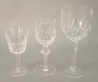 Three sets of Waterford crystal stems to include nine large marquis red wine , seven small red wines, and nine white wines in three...