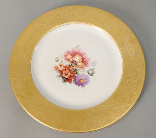 Set of fourteen Hutschenreuther porcelain service plates, each with gilt rim and floral decorated center, marked Royal Bavarian. dia...