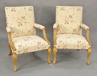 Minton Spidell pair of George II style giltwood library armchairs having square back and vine carved arms on foliate carved cabriole...