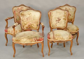 Set of four Louis XV style chairs with Aubusson upholstery including two armchairs and two side chairs. ht. 35 in., seat ht. 16 1/2 in.