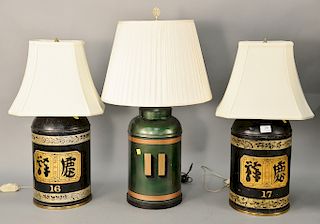 Three told lamps to include Oriental pair of black lamps with painted character (ht. 26 1/2 in.) and a green painted lamp (ht. 32 in...