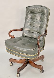 Laurant leather executive armchair having brass rivets. ht. 43 in.