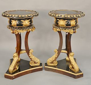 Pair of gilt and painted wood jardinieres, circular top on three leg supports with foliate scrolled feet. 
ht. 39 1/2 in., dia. 23 i...